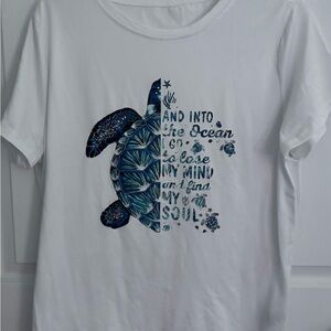 White Shirt with Blue Turtle Design